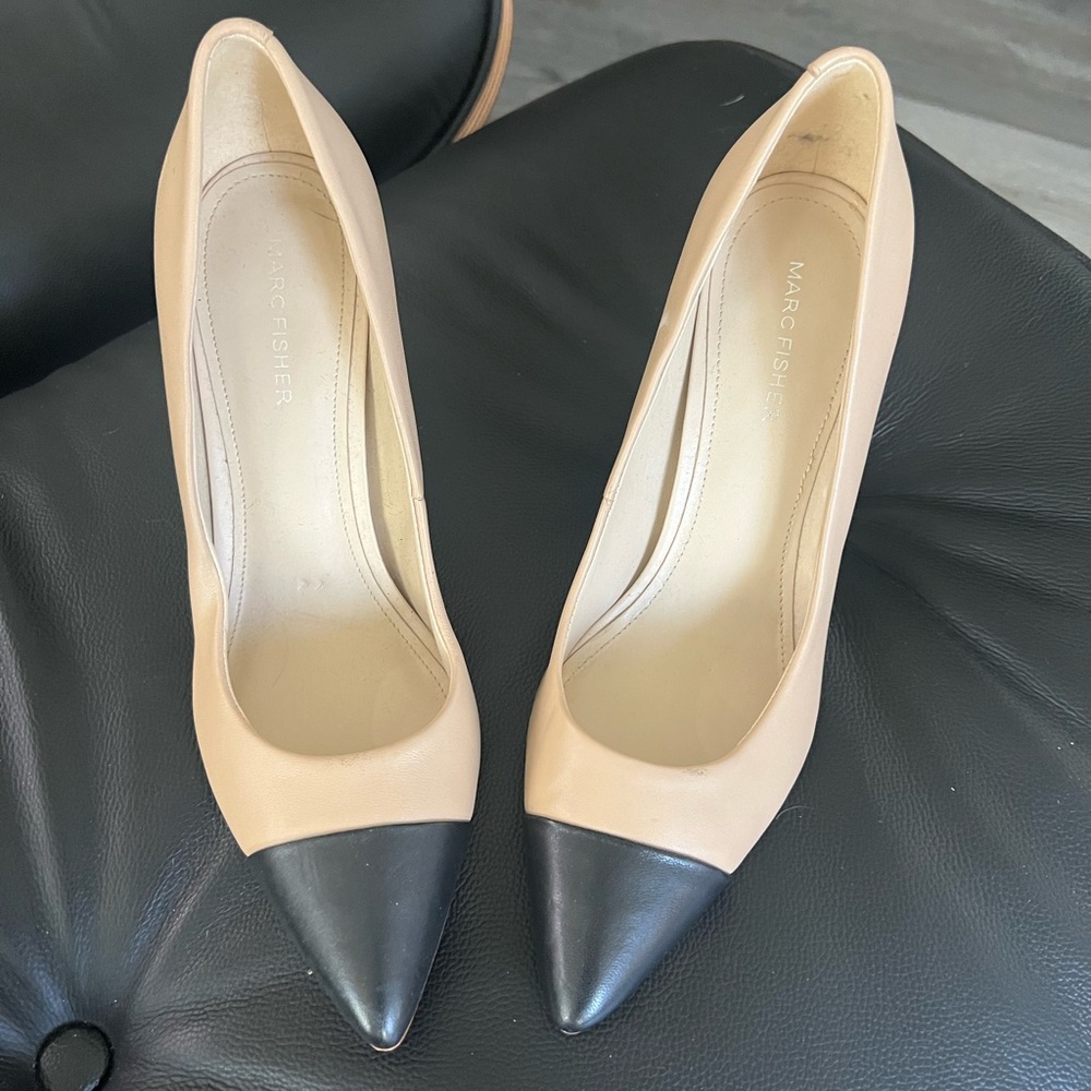 Black cap toed block heels.